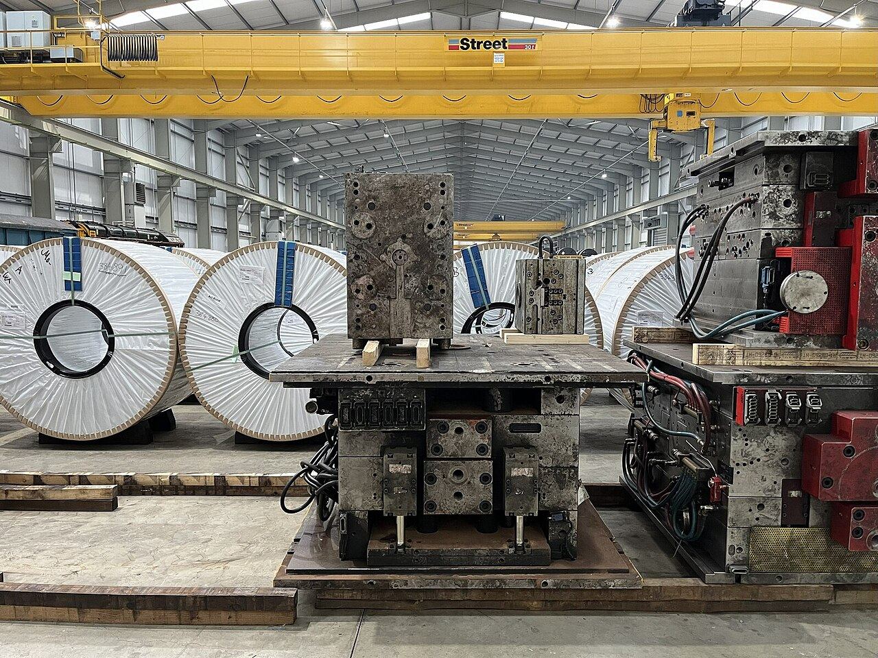 Steel coil on processing machinery